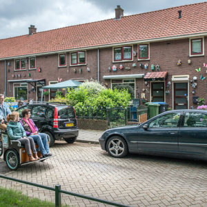 Passagiers in Riksja